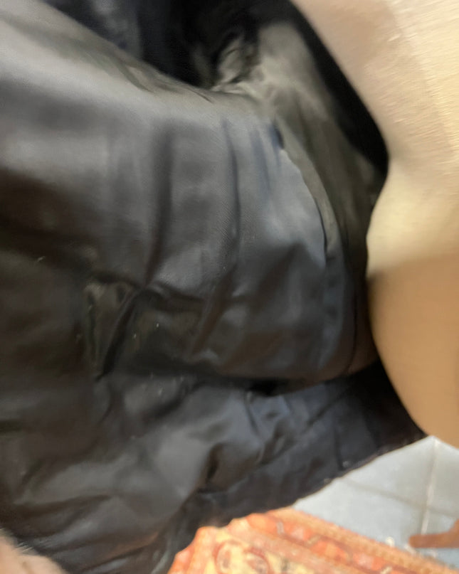 Manteau mi long en pièce de renard vintage utilisé en bon état. 238